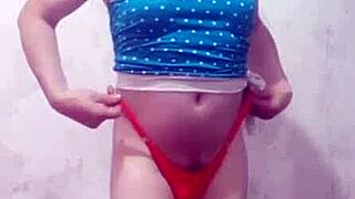 Carolcross twerking in thong lingerie as a crossdressing transsexual.