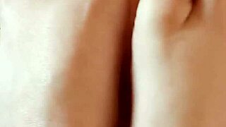 Greta is painting her toenails with polish, looking so cute 😊