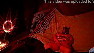 getting frisky in a tent, fingering her wet hole in a hammock, so fun!