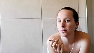 Cute girl smoking in the bathroom, looking so alluring!