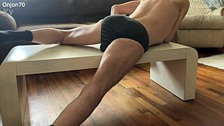 preview of agressive myofascial pressure and release stretching on table in underwear with percussion massager 💪