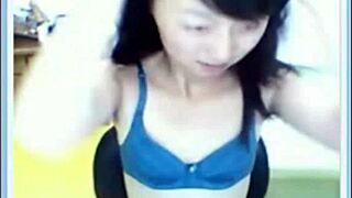 this asian amateur just chilling at home, exploring her body softly, you know, in a solo session