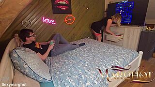 Mother-in-law warms stepson during Pac-Man, he fucks and fills her pussy.