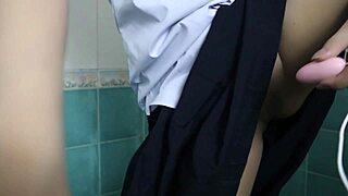 thai student secretly plays with pussy in school bathroom squirts on dildo