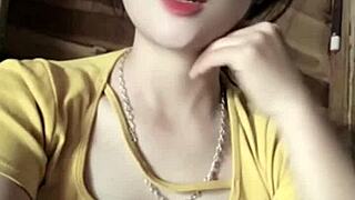 Vietnamese girl dances sexy to music in revealing moves