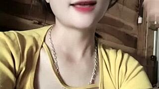 Vietnamese girl dances sexy to music in revealing moves