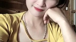 Vietnamese girl dances sexy to music in revealing moves