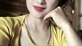 Vietnamese girl dances sexy to music in revealing moves