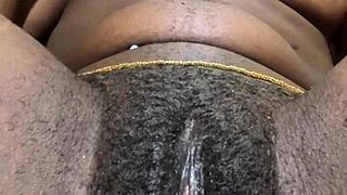 wanna see this hairy ebony babe's wet pussy lips spread wide in solo play?